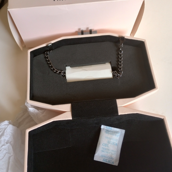 VIKTOR & ROLF Limited Edition Pale Pink Flowerbomb Clutch with Black Wax Seal.